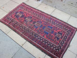 Antique Baluch rug