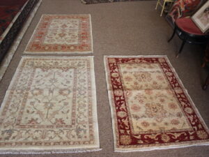 Three small Ziegler rugs